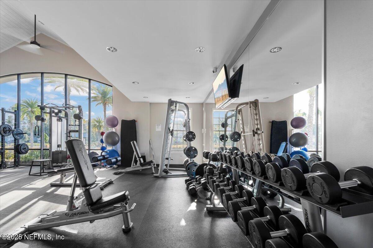 483 St Kitts Loop St. Augustine, FL 32092 - Photo 48 of 52 a view of a room with gym equipment