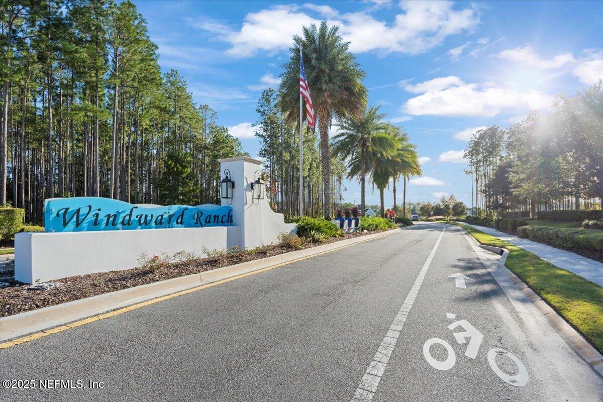 483 St Kitts Loop St. Augustine, FL 32092 - Photo 52 of 52 a view of a street with a park