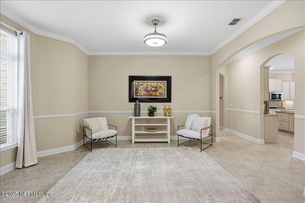 483 St Kitts Loop St. Augustine, FL 32092 - Photo 7 of 52 a bedroom with furniture and a bed