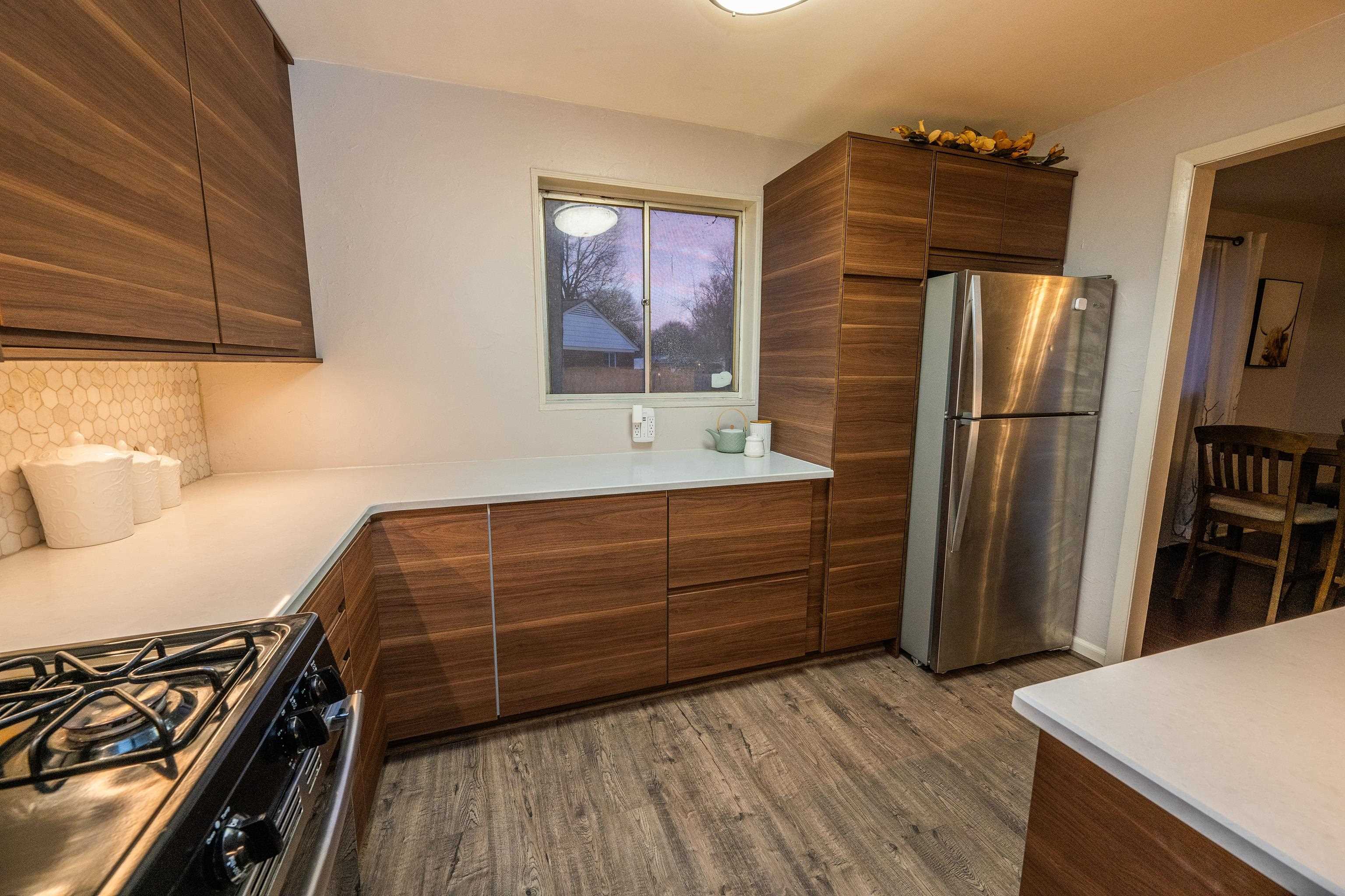 465 McDermitt Road Memphis, TN 38120 - Photo 5 of 14 Brand new kitchen with stainless appliances, under cabinet lighting, and incredible cabinet organization!