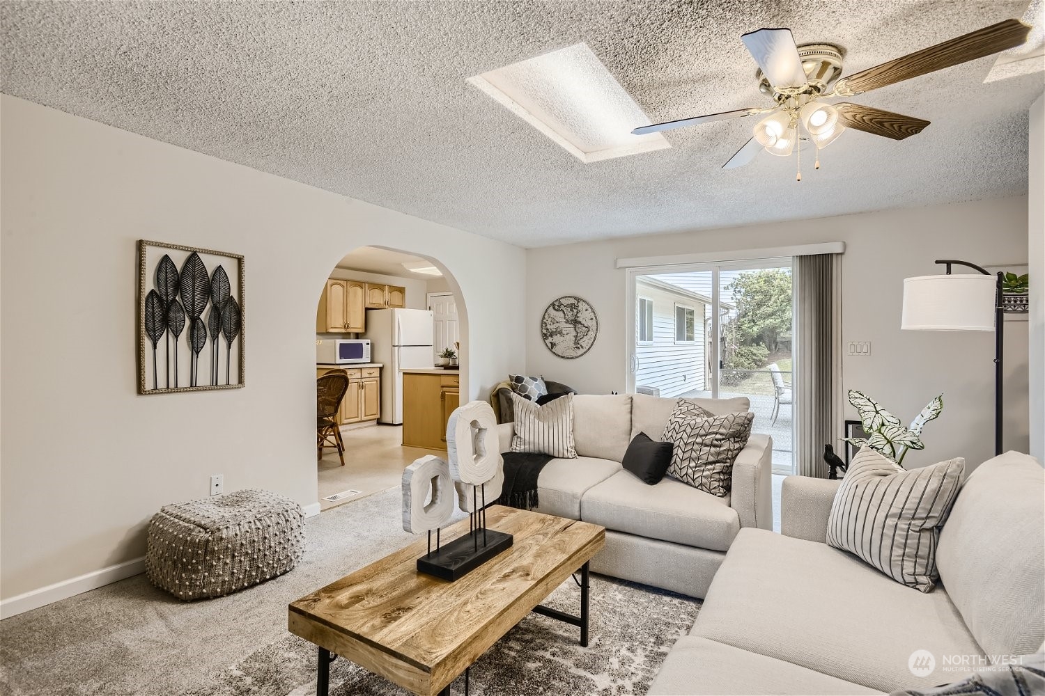 22020 6th Avenue West Bothell, WA 98021 - Photo 11 of 28 a living room with furniture and a large window