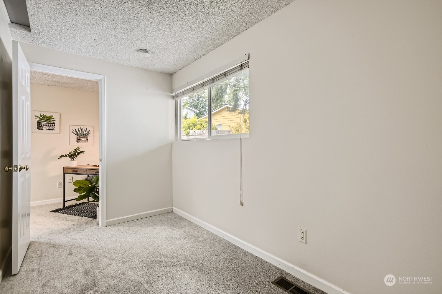 22020 6th Avenue West Bothell, WA 98021 - Photo 14 of 28 an empty room with windows and closet