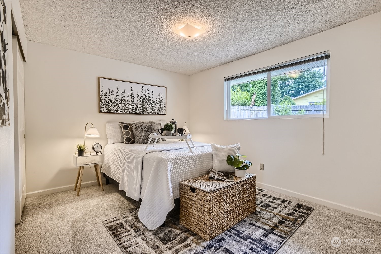 22020 6th Avenue West Bothell, WA 98021 - Photo 16 of 28 a bedroom with a bed and a window