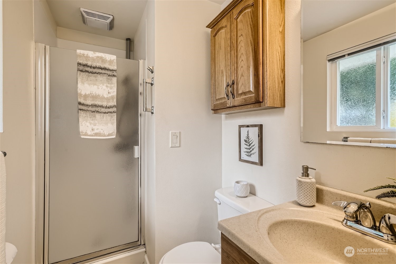 22020 6th Avenue West Bothell, WA 98021 - Photo 18 of 28 a bathroom with a sink toilet and mirror