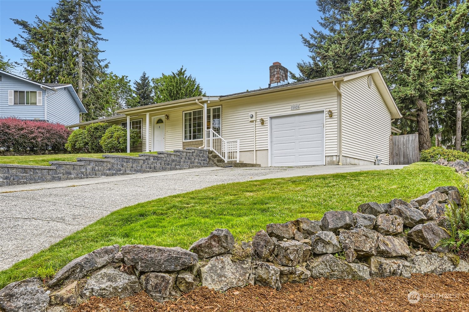 22020 6th Avenue West Bothell, WA 98021 - Photo 2 of 28 a backyard of a house with lots of green space