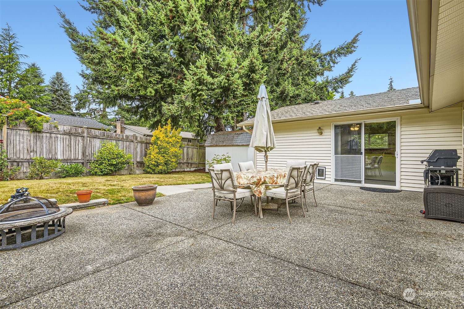 22020 6th Avenue West Bothell, WA 98021 - Photo 24 of 28 a view of a backyard with a patio and swimming pool