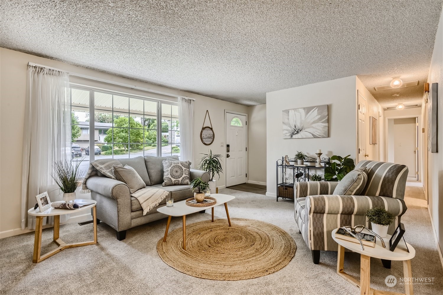 22020 6th Avenue West Bothell, WA 98021 - Photo 4 of 28 a living room with furniture and a large window