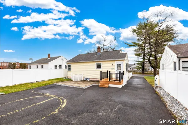 a view of a house with a patio