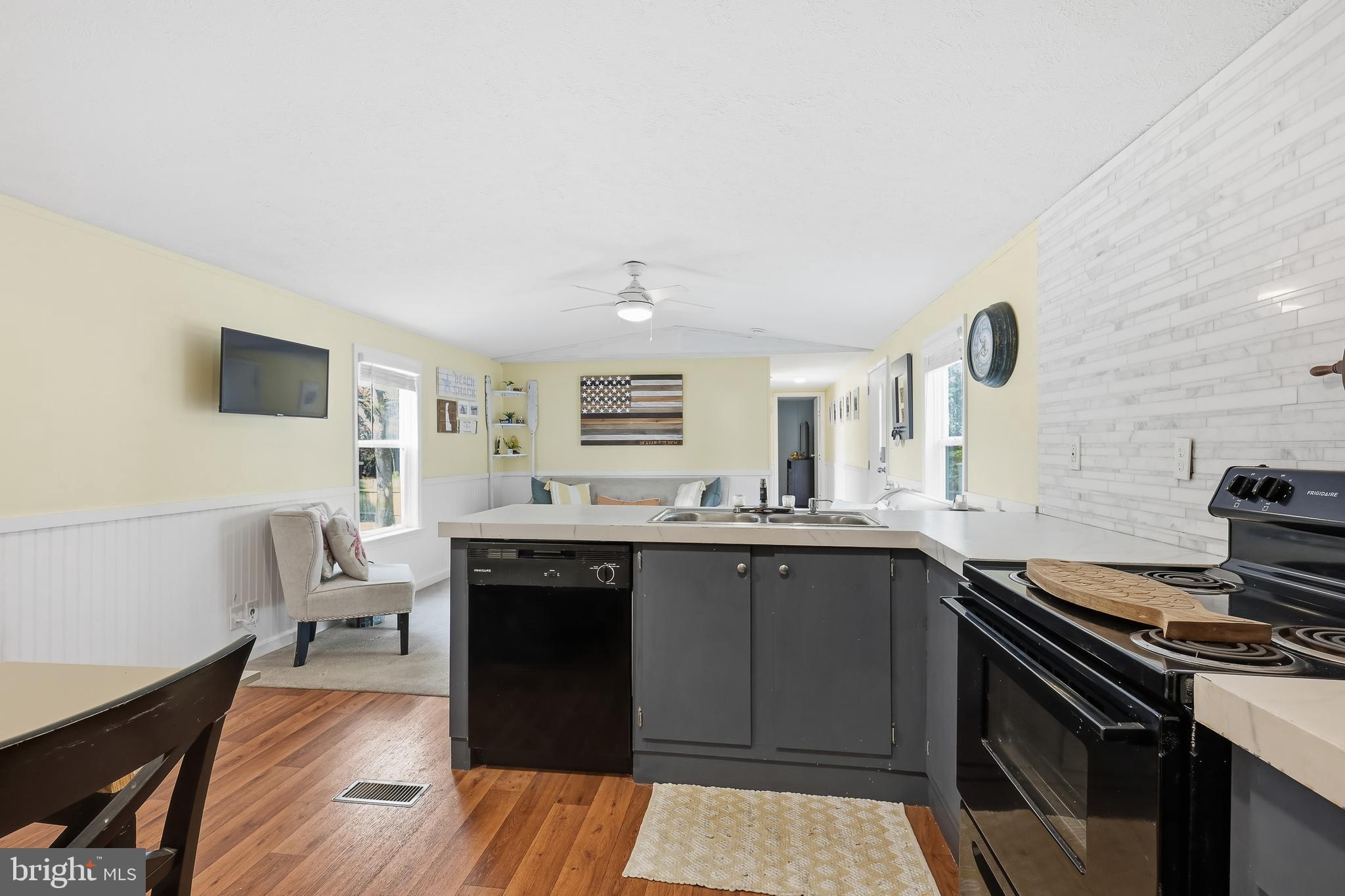 35390 Teal Road, Unit 314 Millsboro, DE 19966 - Photo 8 of 23 a kitchen with a sink and cabinets