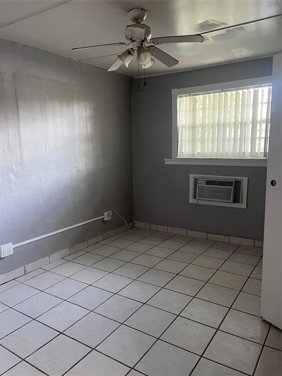 1517 Northeast 30th Street Pompano Beach, FL 33064 - Photo 4 of 4 a view of an empty room with a window