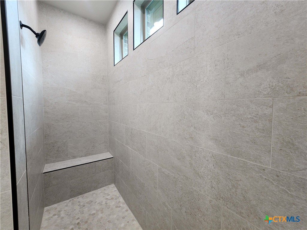 406 Talon Loop Salado, TX 76571 - Photo 24 of 31 a bathroom with a shower
