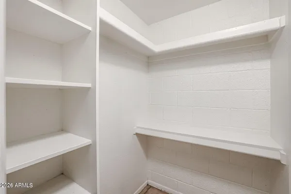 a kitchen with stainless steel appliances a sink and cabinets