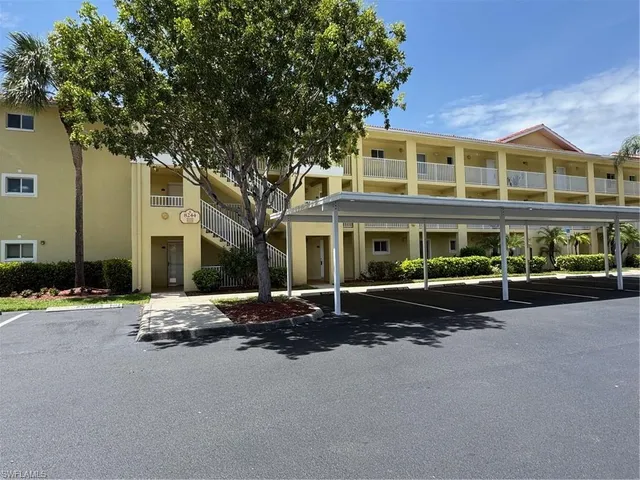 a front view of a building with street view