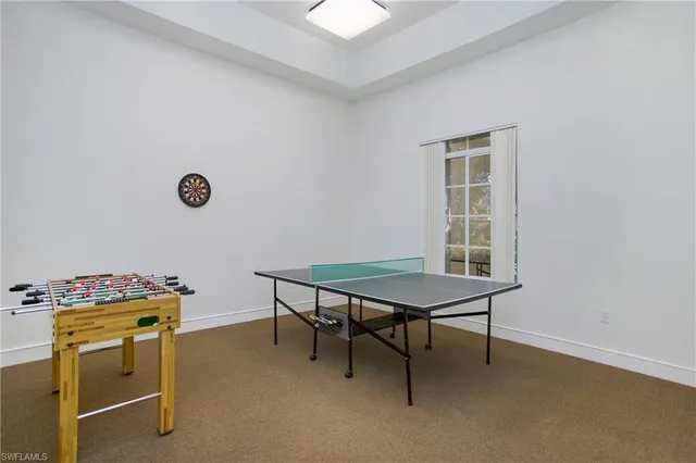 a room with furniture and a window