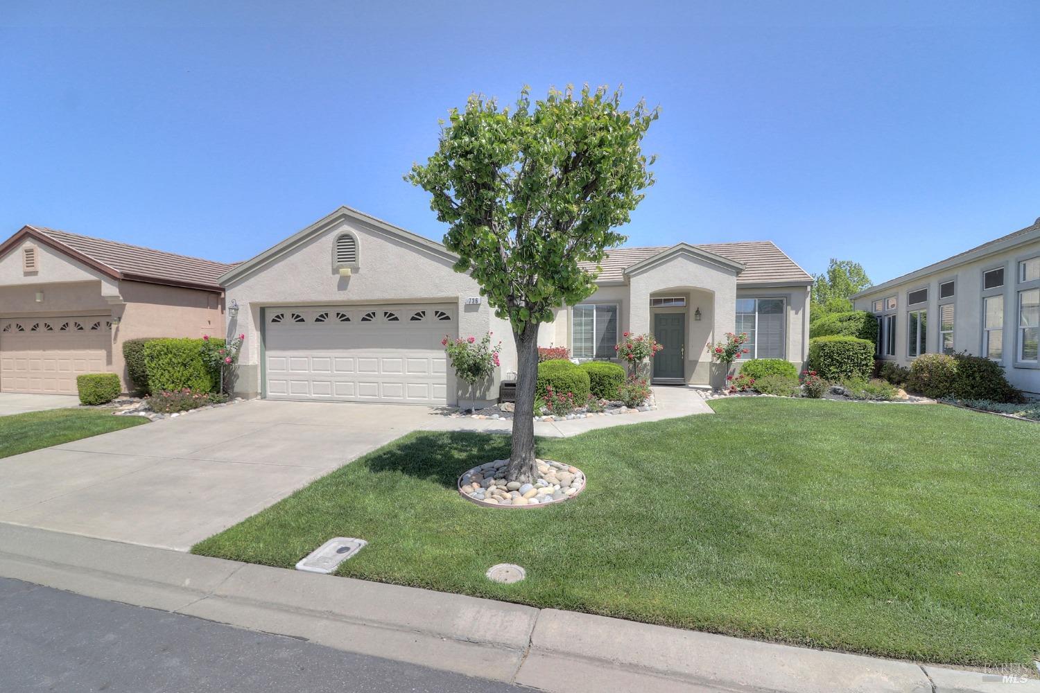 You'll be greeted by lovely roses and manicured bushes and flowers as you approach this meticulously cared for home. New HVAC unit just 2 years old, whole home water filter, garage cabinets, and remodeled bathrooms.