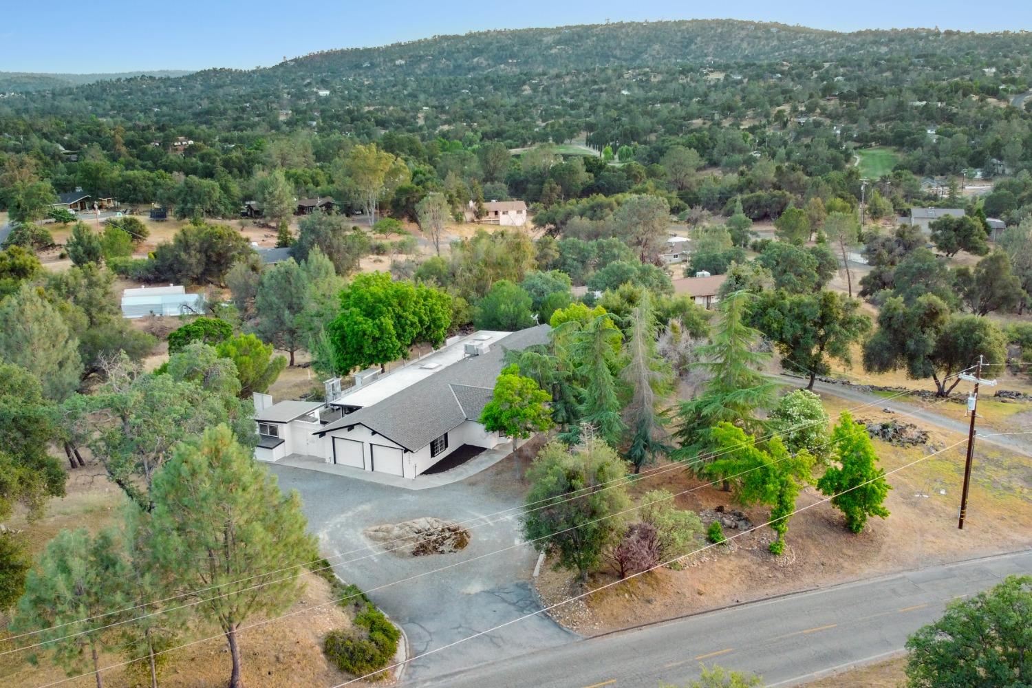 42906 Ranger Cir Drive Coarsegold, CA 93614 - Photo 25 of 29 an aerial view of a house with a yard