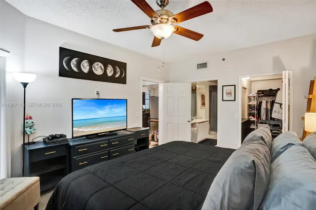 a view of a hallway with seating area