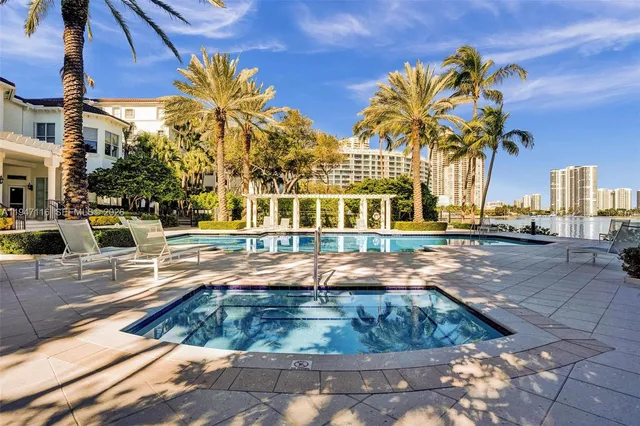 a view of a lake with a city