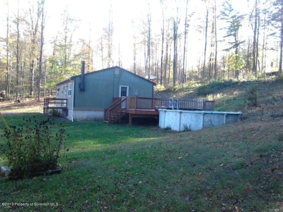 948 State Rte 3010 Springville, PA 18844 - Photo 2 of 7 a backyard of a house with lots of green space