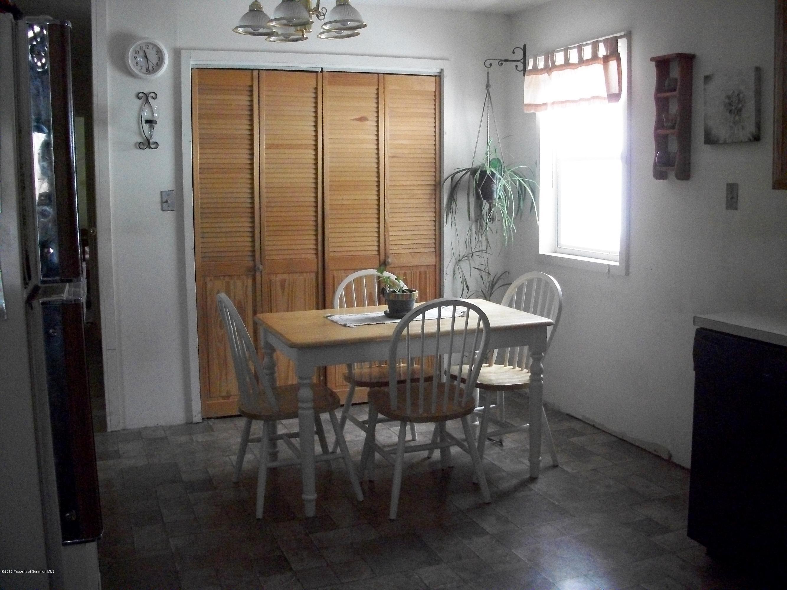 948 State Rte 3010 Springville, PA 18844 - Photo 3 of 7 a dining room with furniture and window