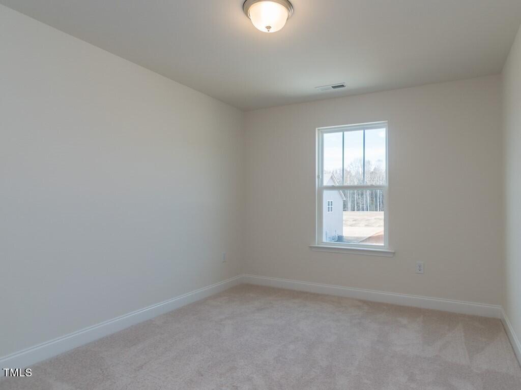937 Channel Drop Loop Zebulon, NC 27597 - Photo 18 of 22 018_ Second Bedroom