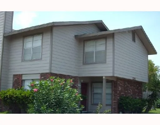 a view of a house with a garage