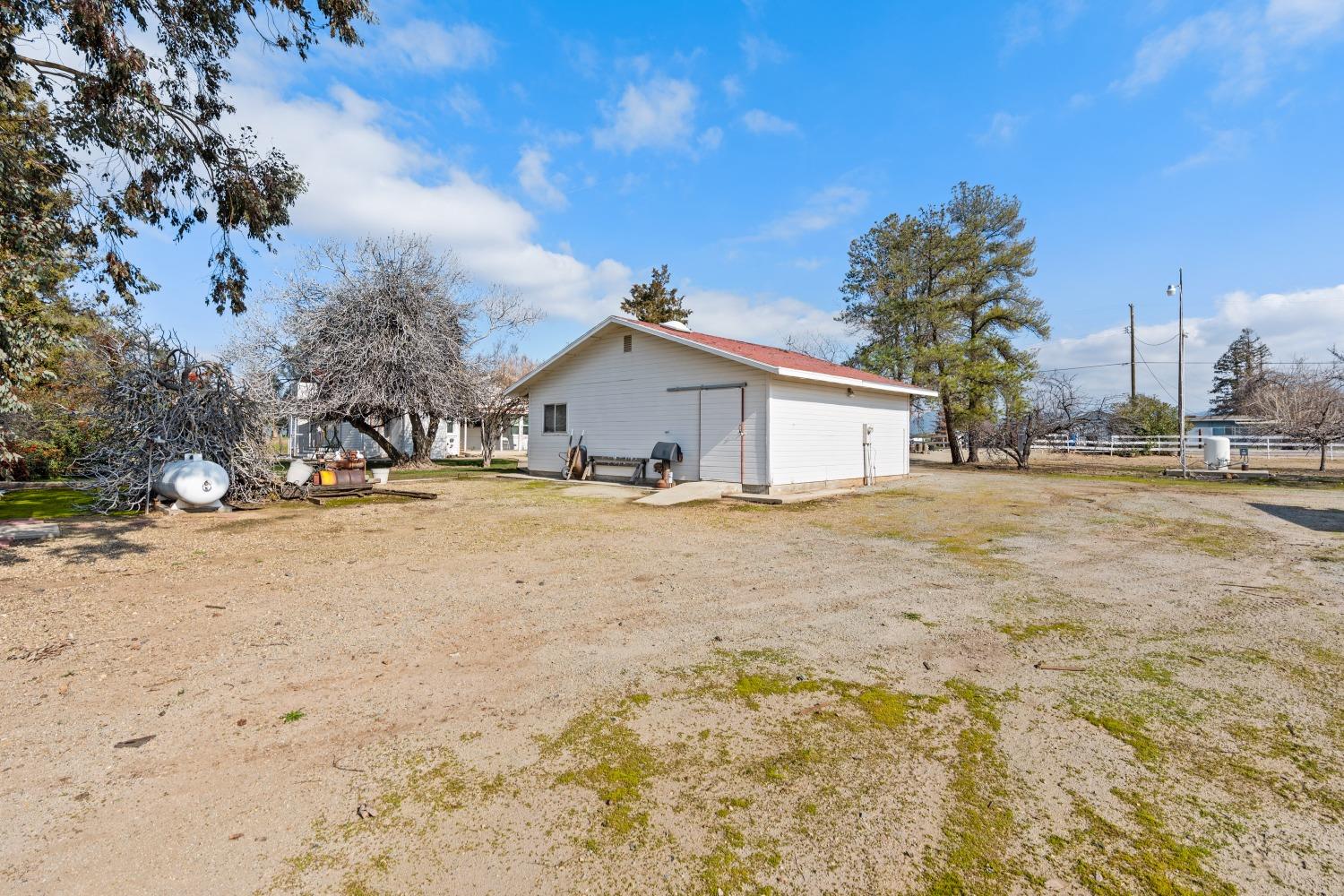1790 North Piedra Road Sanger, CA 93657 - Photo 24 of 32 a view of a house with snow on the road