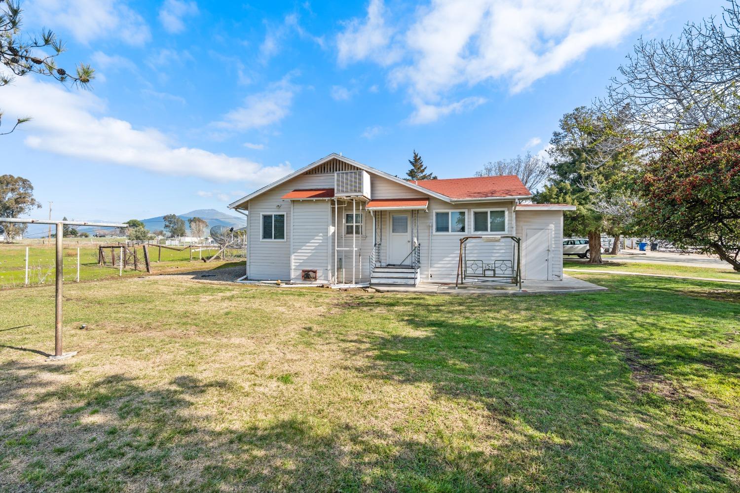 1790 North Piedra Road Sanger, CA 93657 - Photo 3 of 32 a view of a house with a yard