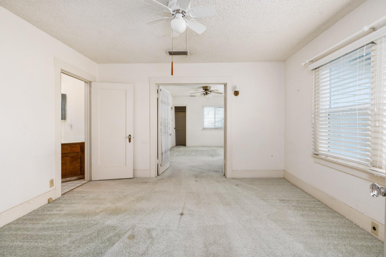 1790 North Piedra Road Sanger, CA 93657 - Photo 8 of 32 a view of an empty room with a window
