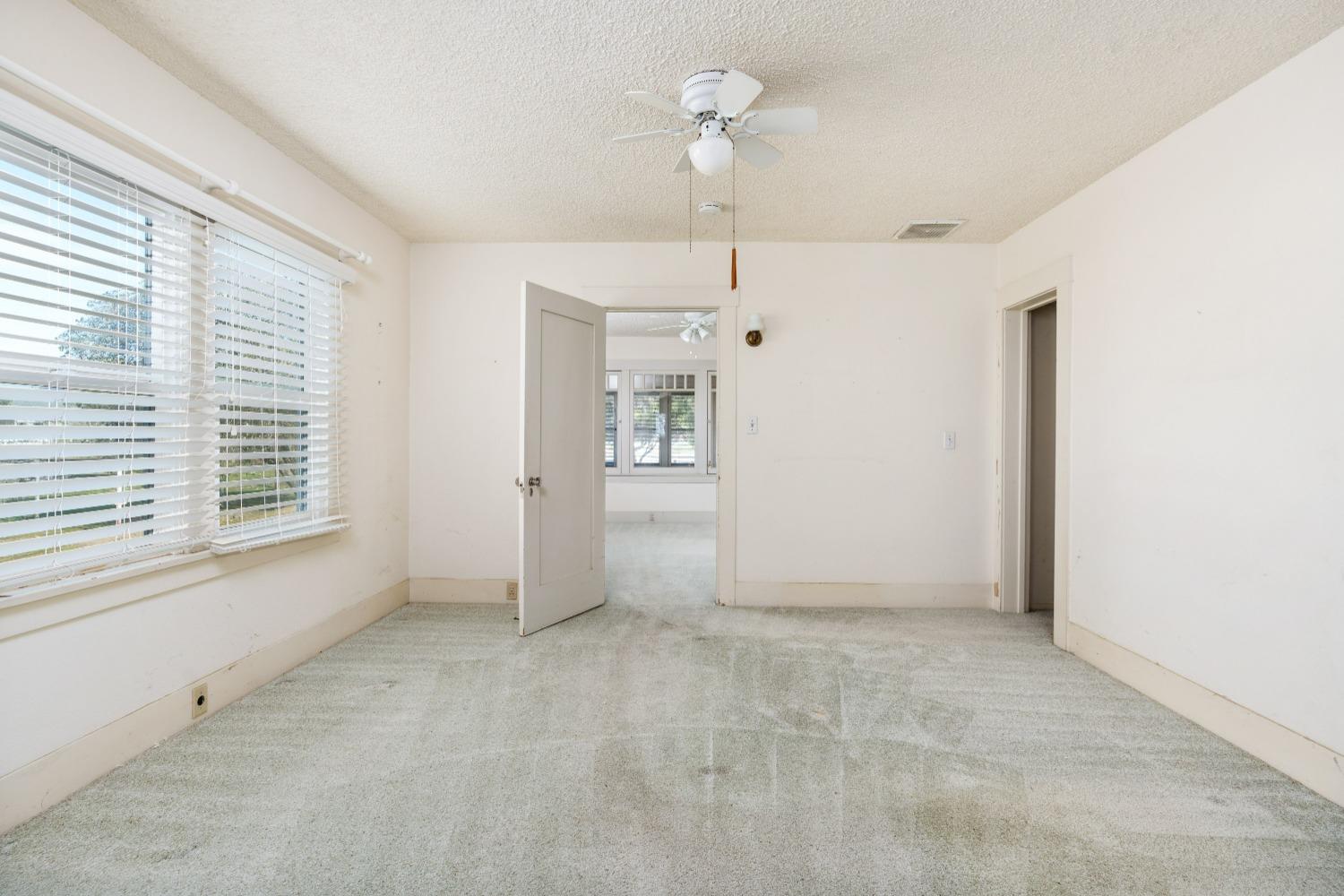 1790 North Piedra Road Sanger, CA 93657 - Photo 9 of 32 a view of an empty room with a window