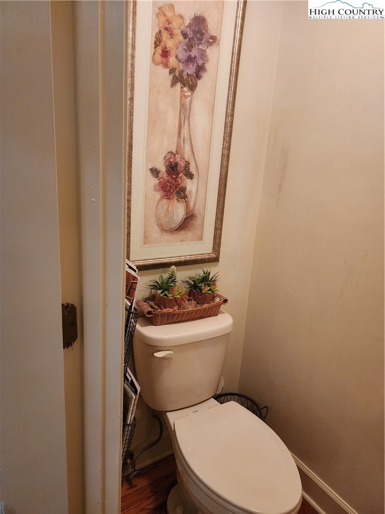 305 Old Farms Road Wilkesboro, NC 28697 - Photo 27 of 50 a white toilet sitting next to a small bathroom