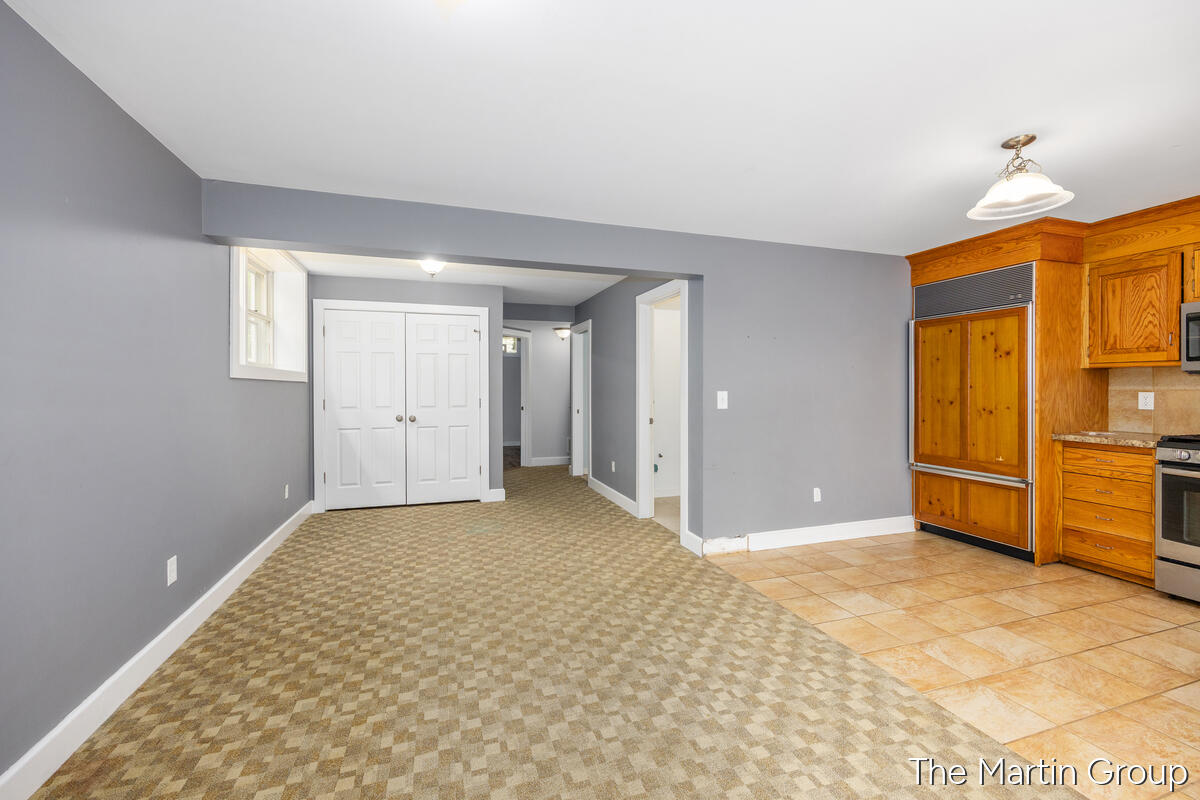 6610 Riga Avenue Northeast Rockford, MI 49341 - Photo 31 of 50 Lower Family Room with Kitchette