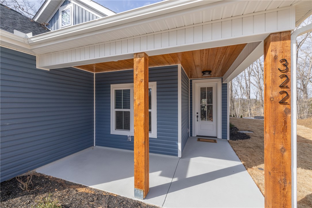 322 Oconee Avenue Westminster, SC 29693 - Photo 1 of 43 This charming residence features a welcoming front porch, perfect for greeting guests and enjoying the outdoors.