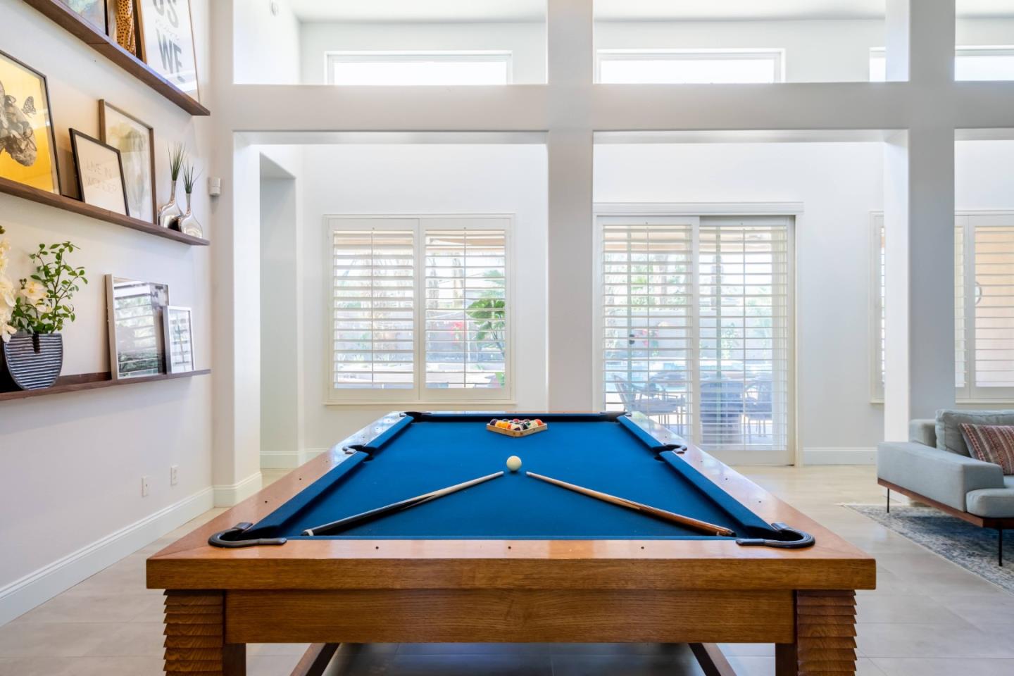 49133 Jordan Street Indio, CA 92201 - Photo 17 of 60 a blue chair sitting in front of a room