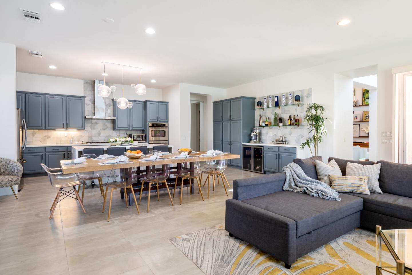 49133 Jordan Street Indio, CA 92201 - Photo 28 of 60 a living room with furniture kitchen view and a dining table