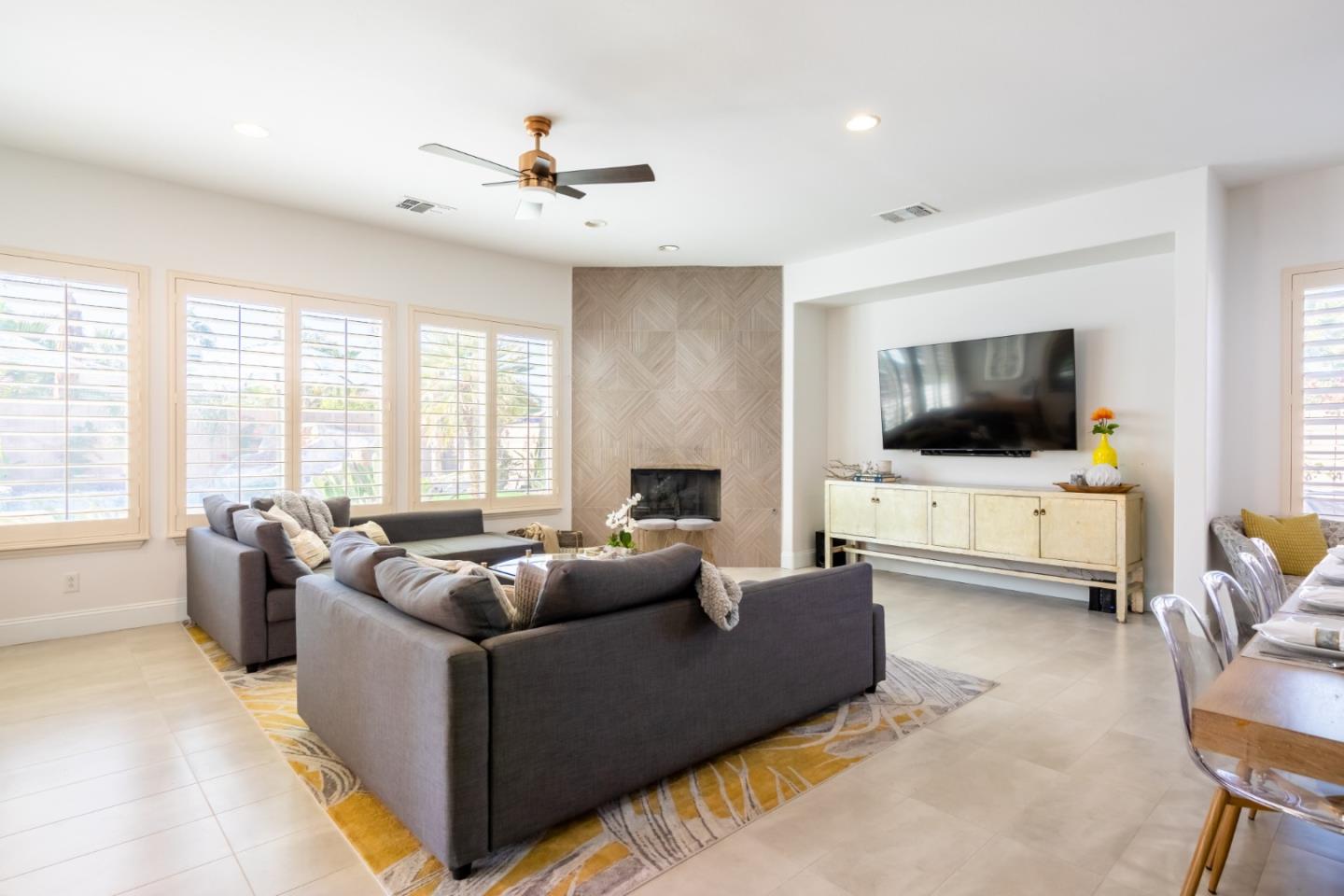 49133 Jordan Street Indio, CA 92201 - Photo 30 of 60 a living room with furniture and a flat screen tv