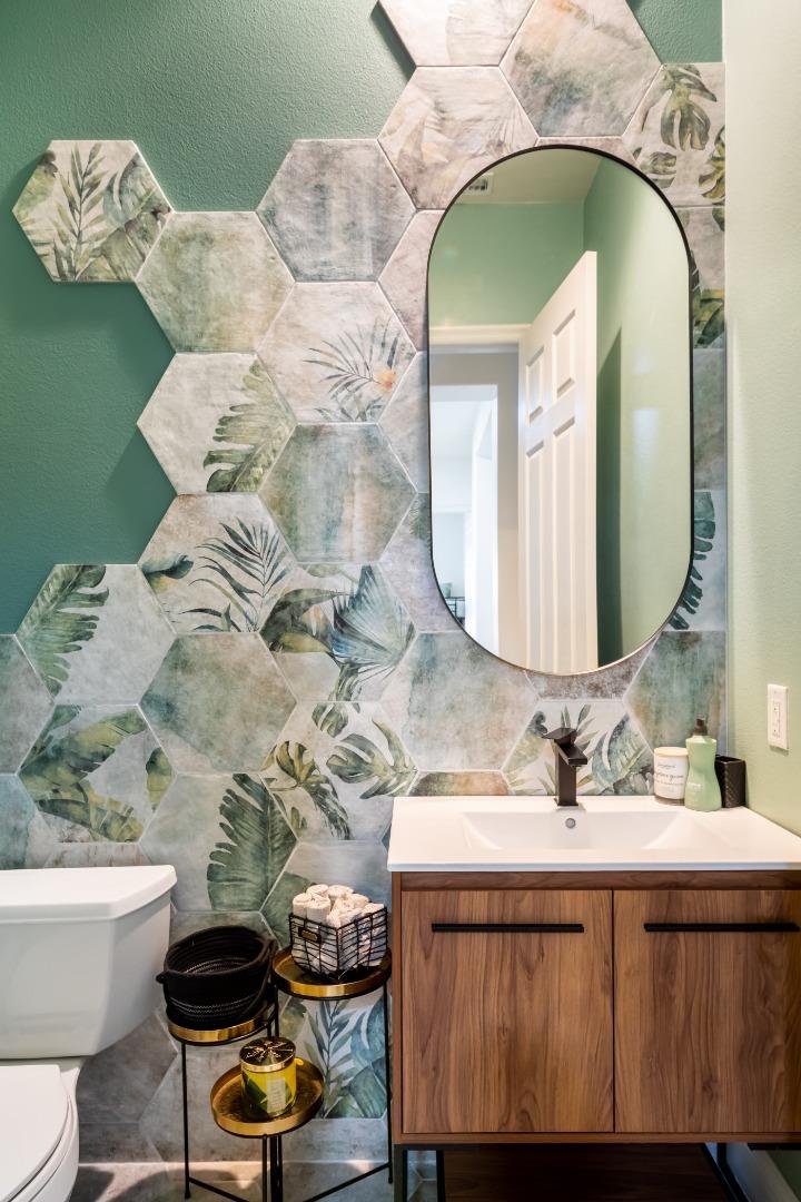 49133 Jordan Street Indio, CA 92201 - Photo 34 of 60 a bathroom with a sink and mirror