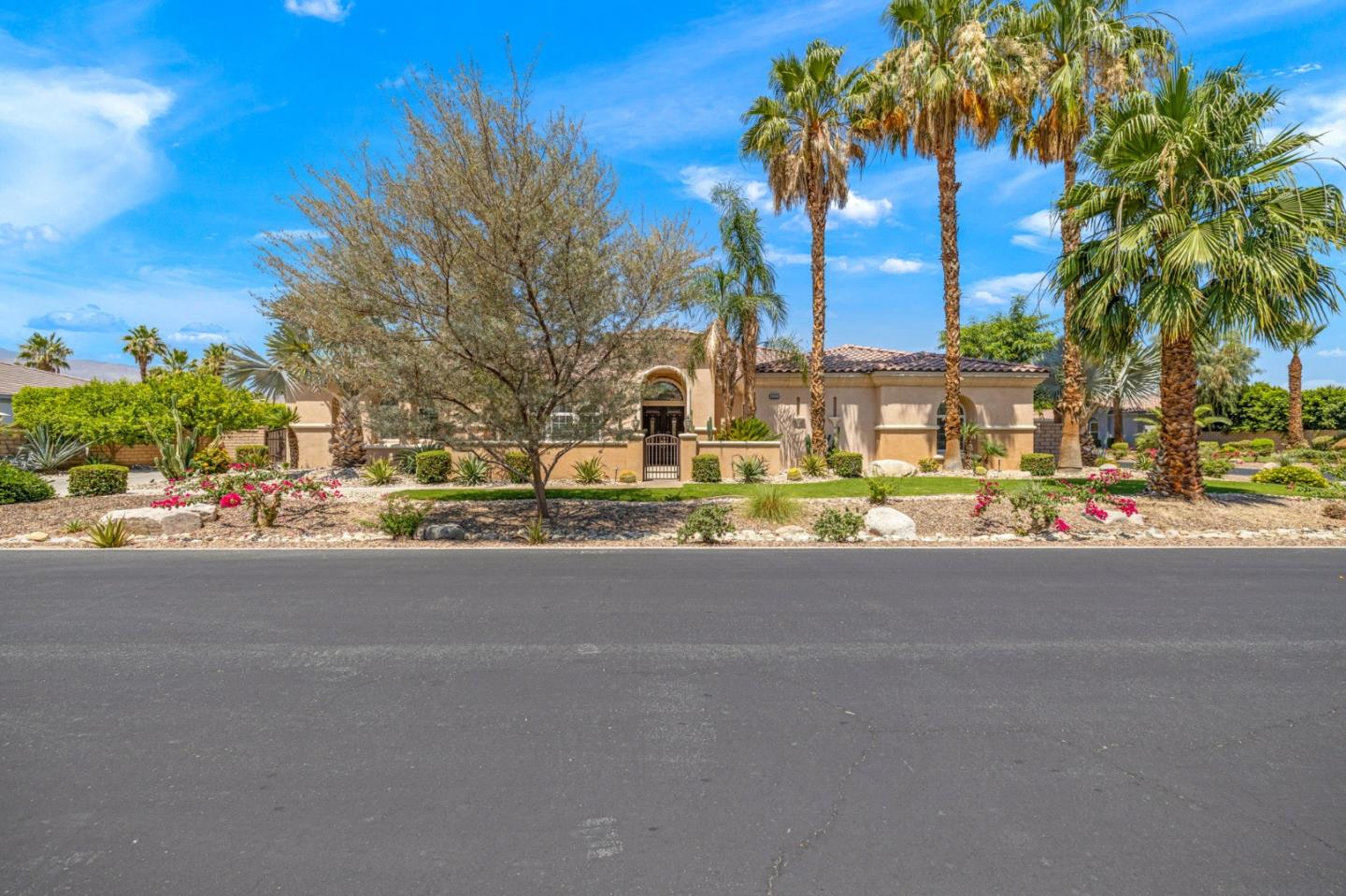 49133 Jordan Street Indio, CA 92201 - Photo 4 of 60 a couple of cars parked in front of a building