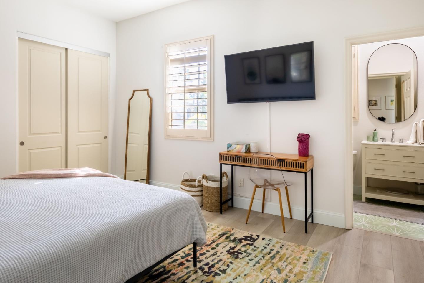 49133 Jordan Street Indio, CA 92201 - Photo 44 of 60 a bedroom with a bed and a flat screen tv