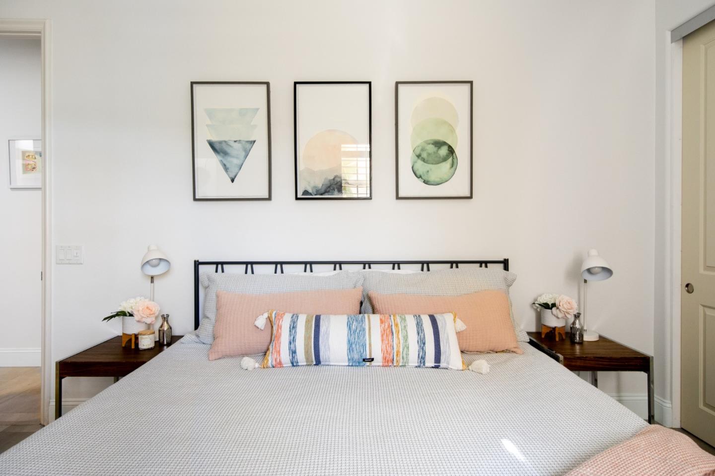 49133 Jordan Street Indio, CA 92201 - Photo 46 of 60 a bedroom with a bed and painting on the wall