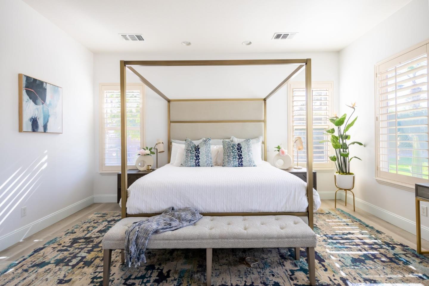 49133 Jordan Street Indio, CA 92201 - Photo 50 of 60 a bedroom with a bed and wooden floor