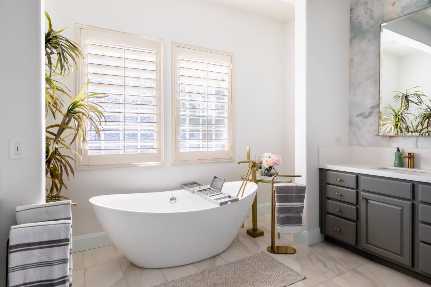 49133 Jordan Street Indio, CA 92201 - Photo 56 of 60 a bathroom with a tub a sink and a window