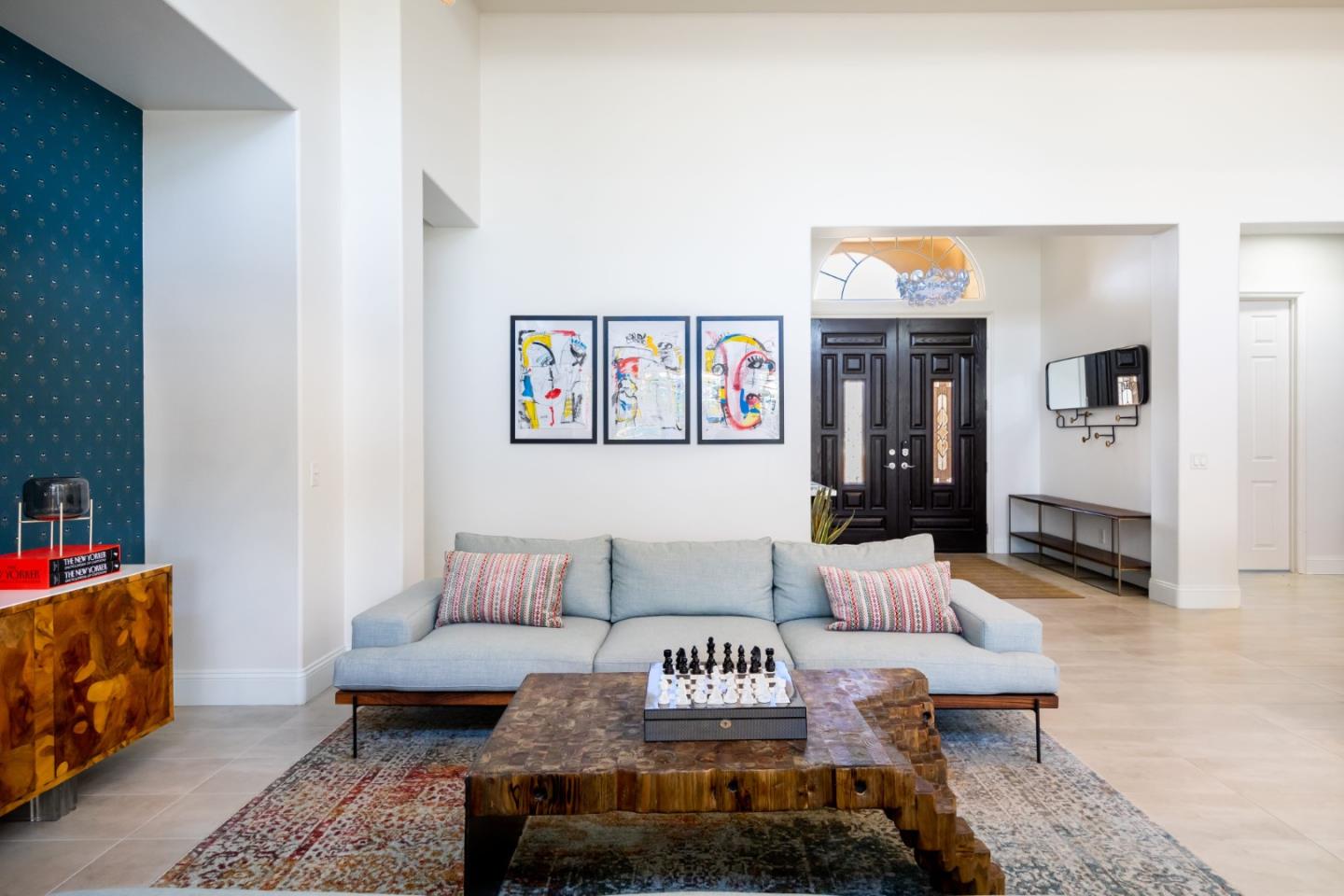 49133 Jordan Street Indio, CA 92201 - Photo 8 of 60 a living room with furniture and painting on the wall