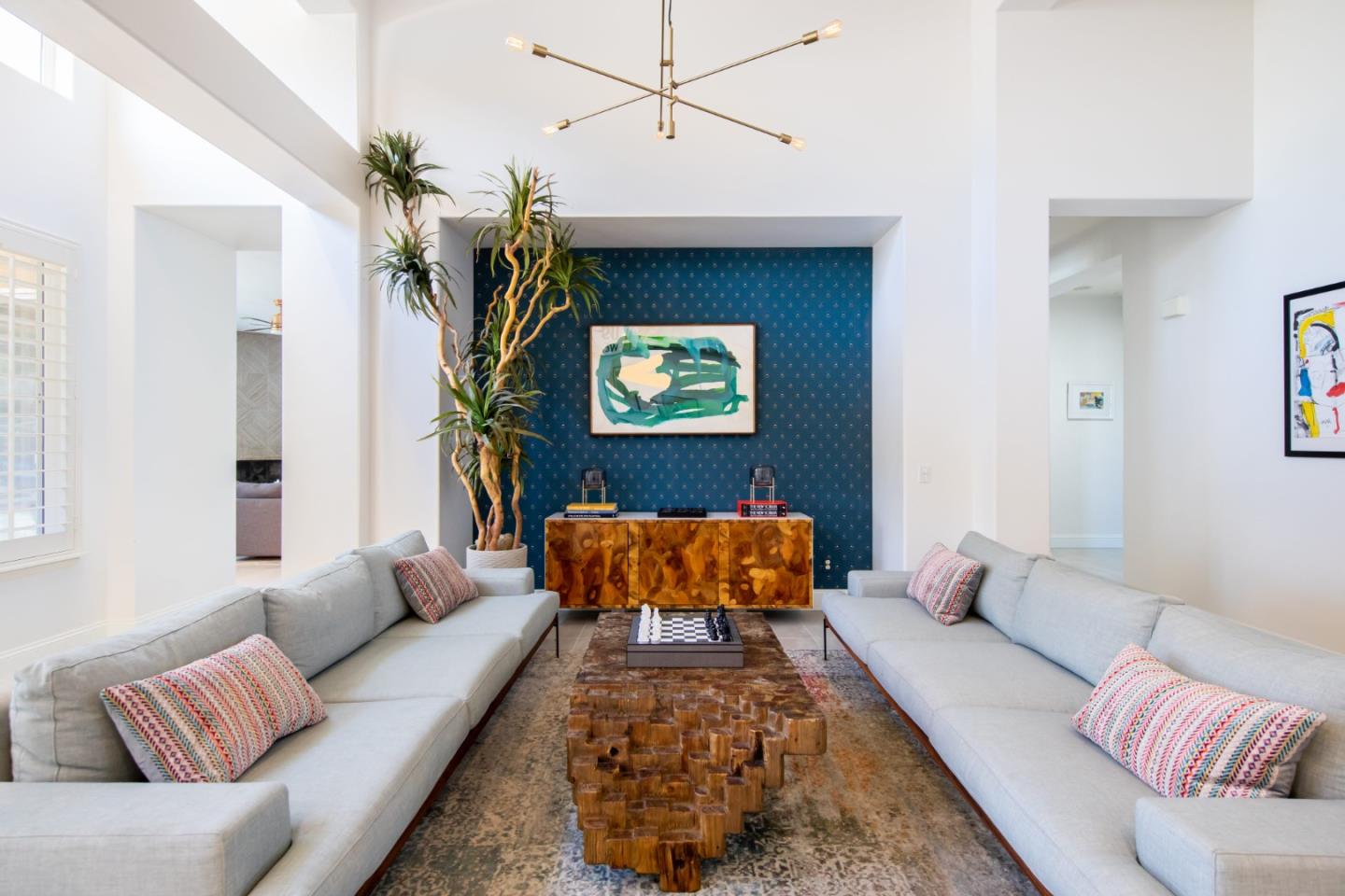 49133 Jordan Street Indio, CA 92201 - Photo 9 of 60 a living room with furniture and a chandelier