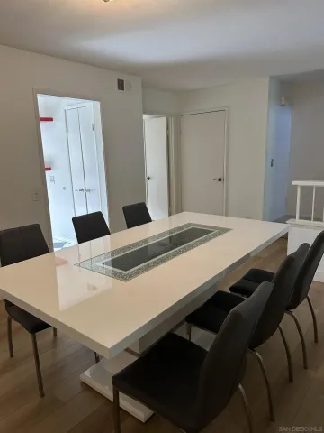 a view of a dining room with furniture