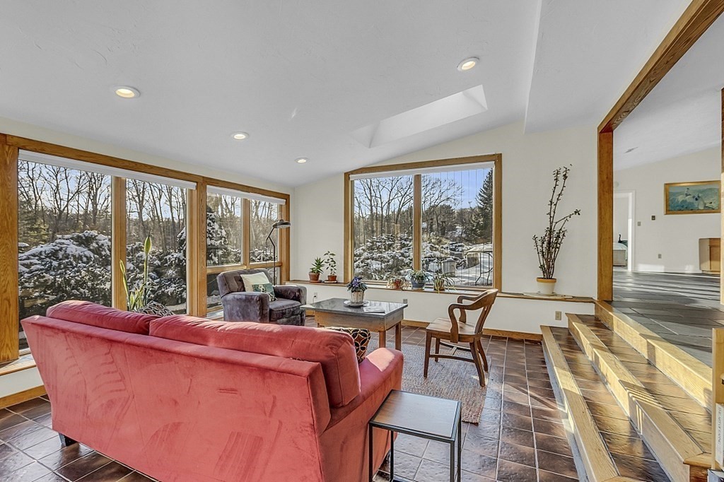296 Boston Road Groton, MA 01450 - Photo 3 of 42 a living room with furniture and large windows
