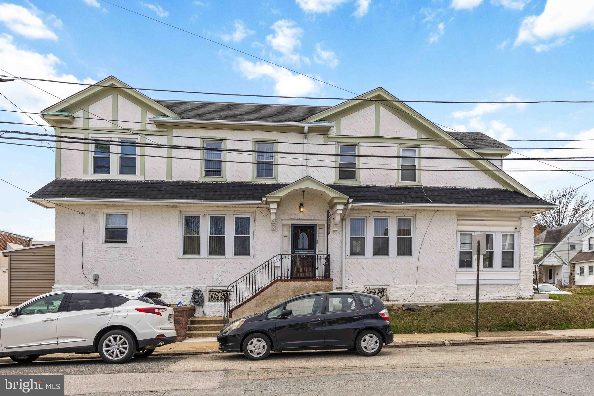 a car parked in front of a house