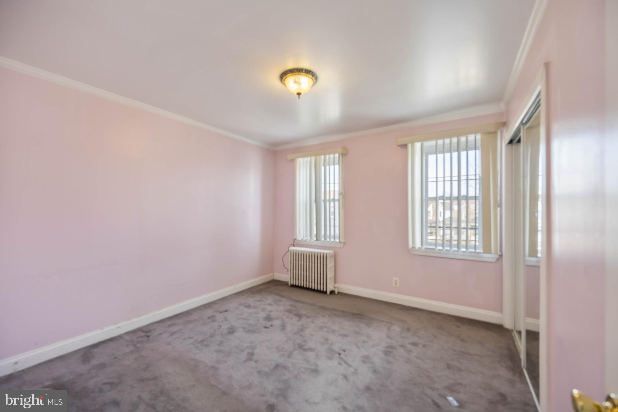537 Elm Avenue Upper Darby, PA 19082 - Photo 17 of 30 a view of an empty room with a window