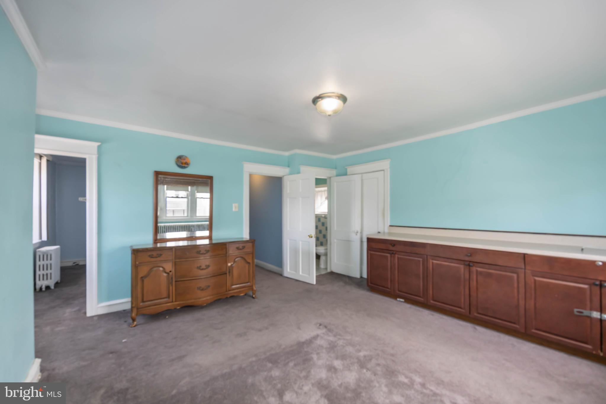 537 Elm Avenue Upper Darby, PA 19082 - Photo 22 of 30 a living room with furniture and a window