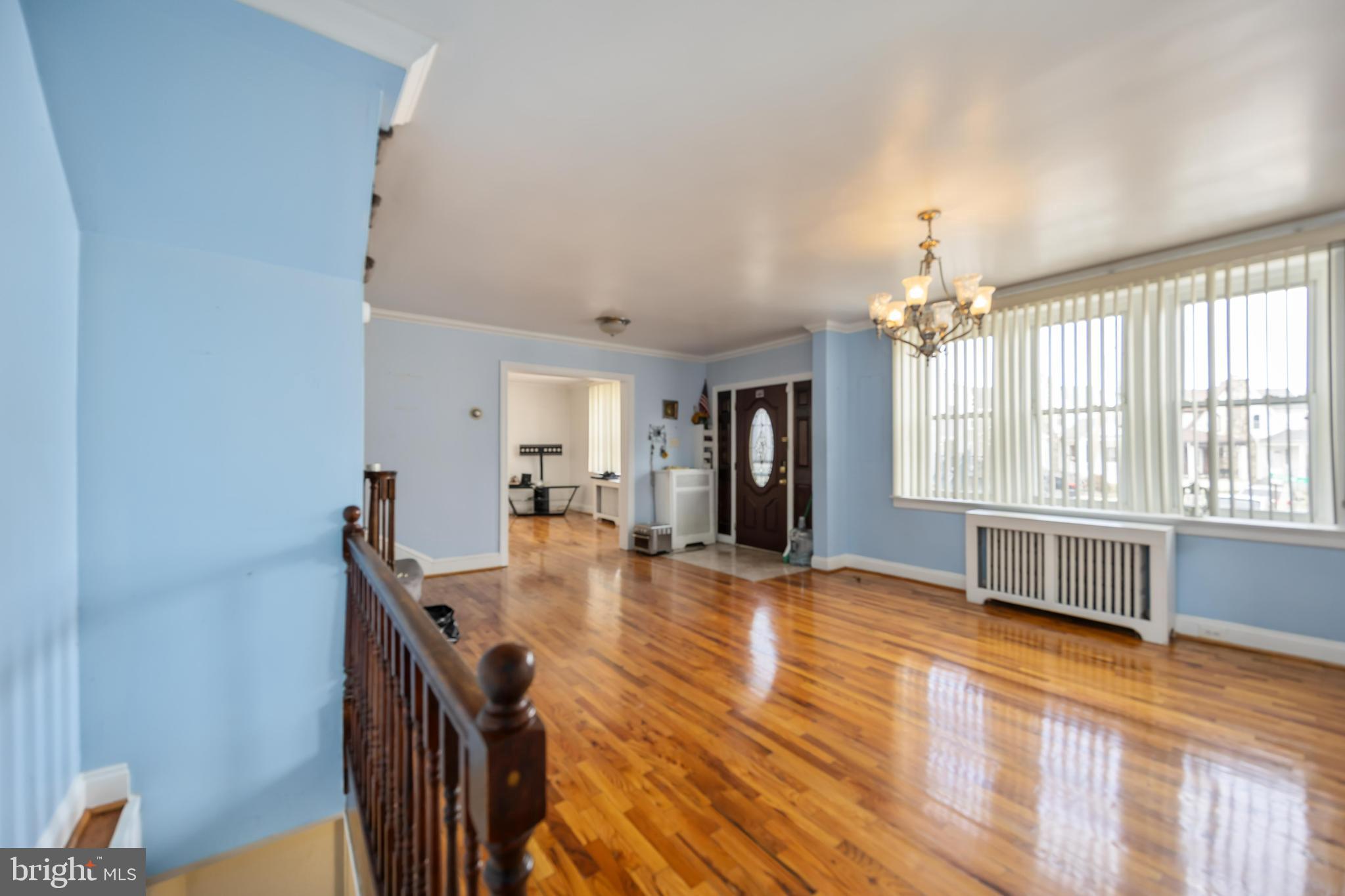 537 Elm Avenue Upper Darby, PA 19082 - Photo 10 of 30 a view of an empty room with window and wooden floor